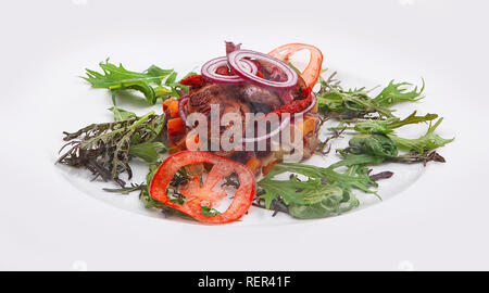 Liver with stewed vegetables, arugula beans Stock Photo
