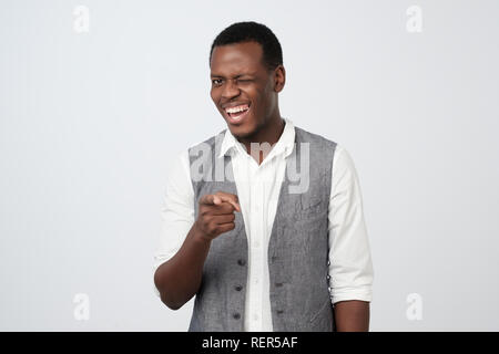 Smiling business man point you saying You are excellent. Stock Photo