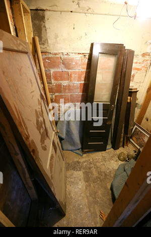 Davenport, Iowa, USA. 17th Jan, 2019. Old doors tucked away under the stairs in the lower level of the former Word of Faith Tabernacle Church on South Clark Street in Davenport. Credit: Kevin E. Schmidt/Quad-City Times/ZUMA Wire/Alamy Live News Stock Photo