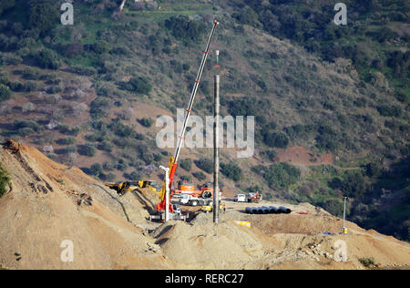 January 22, 2019 - 22 january 2019 (Totalan, Malaga, Andalucia) Yesterday's day ended with good news. It had finally reached 60 meters depth and, despite the 55 hours invested, was already a step away from the Hunosa rescue brigade could start the excavation of the horizontal gallery. But to begin with those four meters that go from the perforation of meter and a half of diameter and the tiny hole of 25 centimeters where Julen fell nine days ago is getting too complicated. From the level minus 40, the protection tubes do not fit and it has been decided to re-drill with a slightly larger thicke Stock Photo