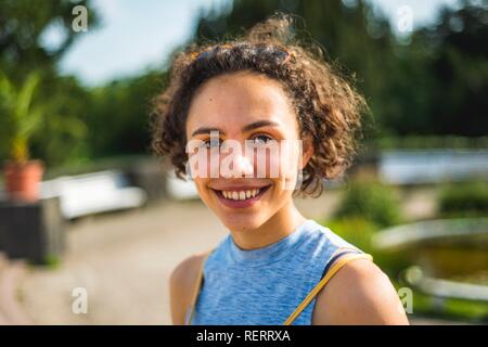 Portrait of a pretty young woman, smiles, Berlin, Germany Stock Photo