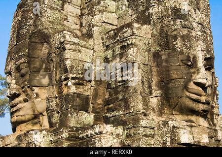Giant faces carved into stone, Bayon, Angkor Thom, UNESCO World Heritage Site, Siem Reap, Cambodia, Southeast Asia Stock Photo