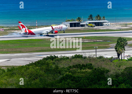 Montego Bay, Jamaica - March 27 2015: Air Canada aircraft landing at the Sangster International Airport (MBJ) in Montego Bay, Jamaica Stock Photo