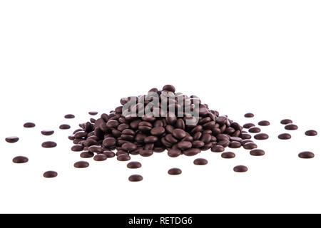Chocolate Chips pile or small candies on White Background. Stock Photo