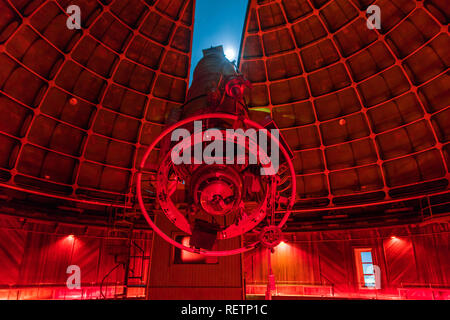 May 19, 2018 San Jose / CA / USA - The historical 36-inch Shane telescope at Lick Observatory ready for night sky viewing; red lights switched on; Mou Stock Photo