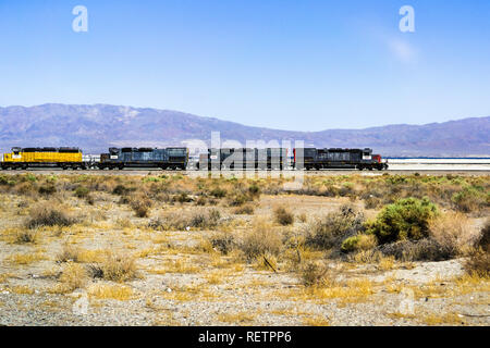 Train engines stopped on the tracks going through Searles Valley, Mojave Desert, California Stock Photo