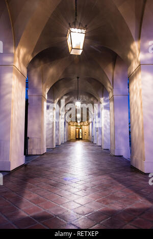 Night view of the colonnade surrounding the historical City Hall building of Pasadena, Los Angeles county, California; the building was completed in 1 Stock Photo