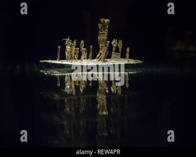 Bogota, Colombia - November 23, 2018: Interior of the Museum of Gold. The Muisca raft is the main piece in the Offering Boat Room Stock Photo