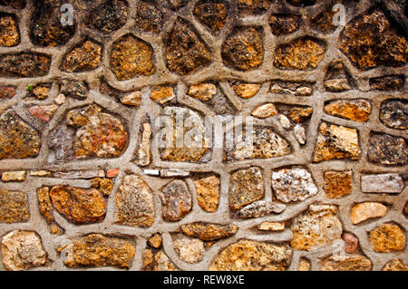 Yellow sandstone and thick cement surface, macro Stock Photo