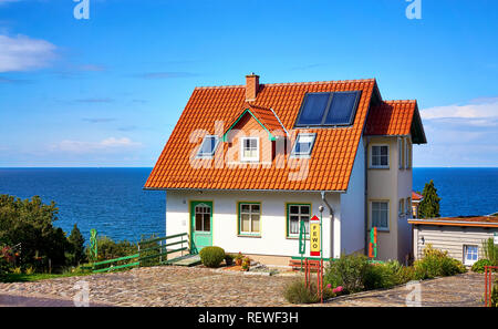 Tourist house on the Baltic Sea in Lohme on the island of Rügen. - Letters with FEWO Means holiday apartment. Stock Photo