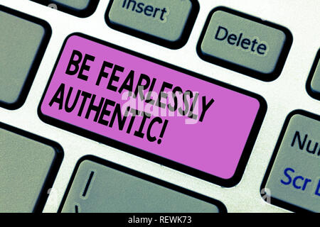 Handwriting text writing Be Fearlessly Authentic. Concept meaning send out targeted messages at designated times Keyboard key Intention to create comp Stock Photo