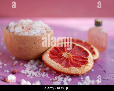 Himalayan pink salt, pink grapefruit and essential oil spa treatment Stock Photo