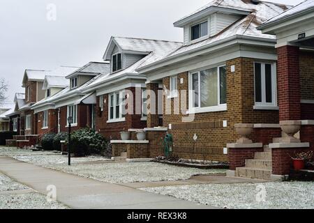 Chicago, Illinois, USA. A block of bungalow-styled homes typical and found thoroughout city neighborhoods. Stock Photo
