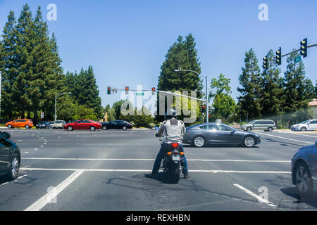 July 28, 2017 Sunnyvale/CA/USA - Motorcyclist waiting at a traffic light Stock Photo
