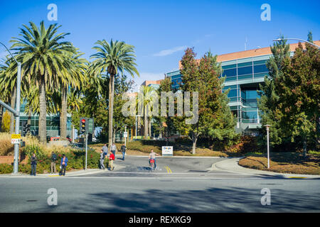 December 13, 2017 Mountain View / CA / USA - Google office buildings located in the campus situated in Silicon Valley; employees waiting to cross the  Stock Photo