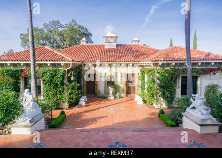 December 23, 2017 San Simeon / CA / USA - Casa del Sol cottage covered in bougainvillea, Hearst Castle Stock Photo