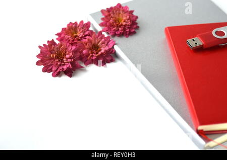 Fall autumn floral background with deep red chrysantemums on white with copy space. Greeting card mockup and border. Desktop workspace flat layout. Stock Photo