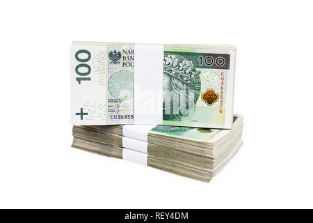 Bundles of polish 100 zloty banknotes. Isolated on white. Clipping Path included. Stock Photo