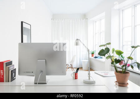 Desktop computer and desk in a modern office Stock Photo