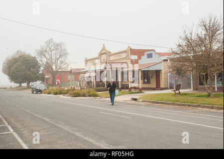 Man walking on the street in Walwa, Victoria, Australia Stock Photo