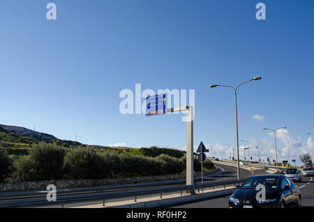 Mellieha, Malta 30 december 2018 Road to popeye village, sign showing 1km to destination Stock Photo