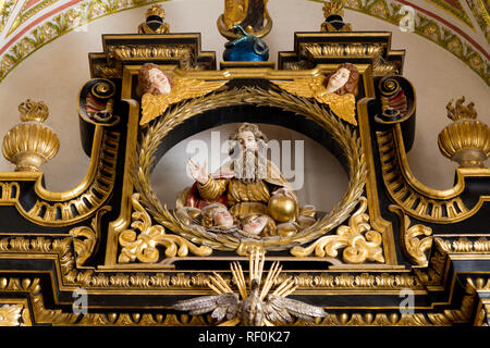 Trnava, Slovakia. 2018/4/12. A statue of God the Father in reredos (raredos), i.e. a large altarpiece. The Saint John the Baptist Cathedral in Trnava. Stock Photo