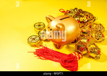 The Golden Pig piggy bank on white background Stock Photo - Alamy