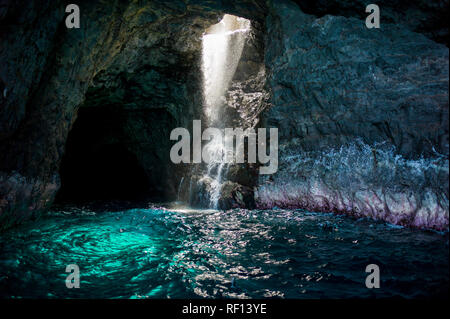 The rugged volcanic Na Pali Coast State Park on the north shore of Kauai, Hawaii, United States, is accesible only by boat or on foot. Stock Photo