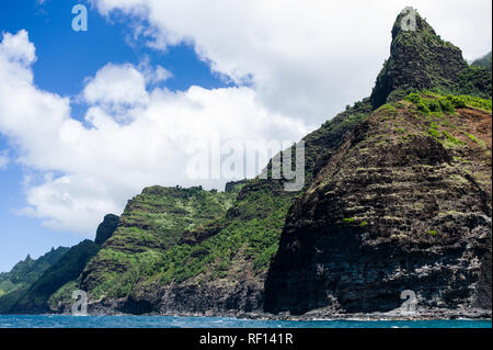 The rugged volcanic Na Pali Coast State Park on the north shore of Kauai, Hawaii, United States, is accesible only by boat or on foot. Stock Photo