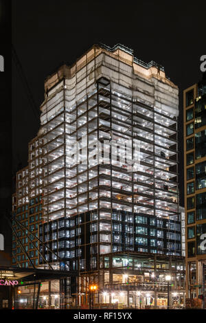 Brightly Illuminated Building Under Construction, Boston USA Stock Photo