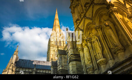 Intense Summer colors and a tourist perspective view of the Salisbury cathedral, Cathedral Church of the Blessed Virgin Mary, Salisbury, UK Stock Photo