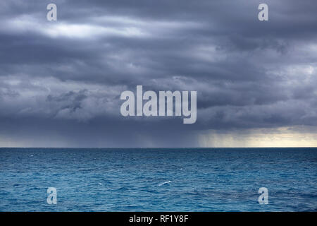 cloudy dramatic sky over turquoise tropical sea, Ishigaki; JApan Stock Photo