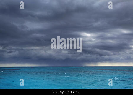 cloudy dramatic sky over turquoise tropical sea, Ishigaki; JApan Stock Photo