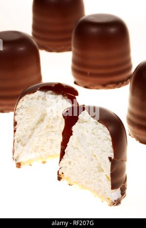 Chocolate-coated marshmallow sweets Stock Photo