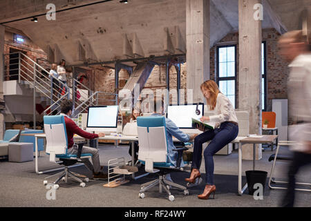 People working in big modern office Stock Photo