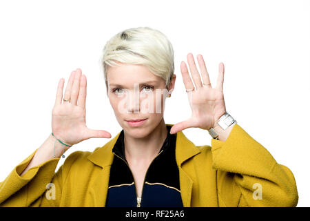 Portrait of woman showing her palms Stock Photo