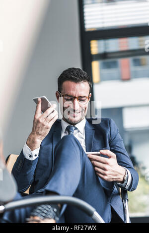 Businessman talking on the phone Stock Photo