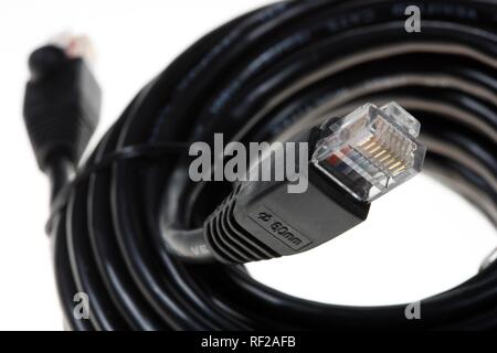 Coiled computer network cables used to connect to an internal or ...