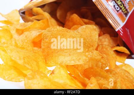 Potato chips flavoured with paprika powder Stock Photo