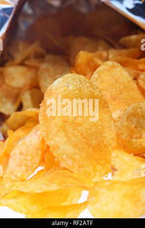 Potato chips flavoured with paprika powder Stock Photo