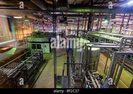 Industrial interior of soft drinks factory with tubes Stock Photo