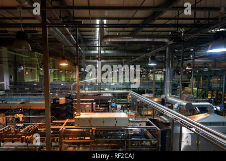 Industrial interior of soft drinks factory with tubes Stock Photo