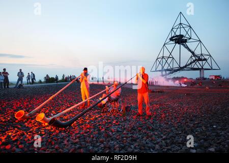 Alpenhorn players during the additional shift, long night of industrial culture, volcano expedition theme, on the Tetraeder Stock Photo