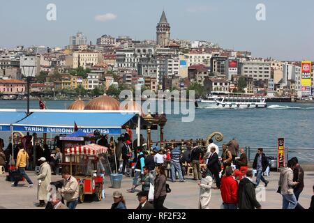 Restaurants, snack bars offering fish at Galat Bridge on the Golden Horn, Istanbul, Turkey Stock Photo