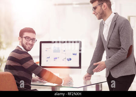 two businessmen analyzing stats financial data Stock Photo