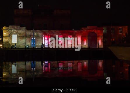 Leith, Edinburgh, Scotland, United Kingdom, 23 January 2019. Message from the Skies is a nightly light projection in six locations in the capital. It is commissioned by Edinburgh’s Hogmanay and Edinburgh International Book Festival, produced by Underbelly with Edinburgh UNESCO City of Literature Trust and supported by Creative Scotland. Leith Custom House with Chitra Ramaswamy's story A Love Letter to Europe Stock Photo