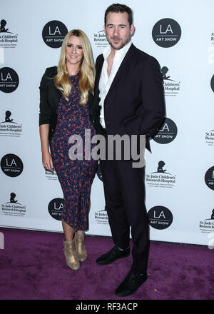 Katy O'Grady and Barry Sloane attending the 26th Annual Race to Erase ...