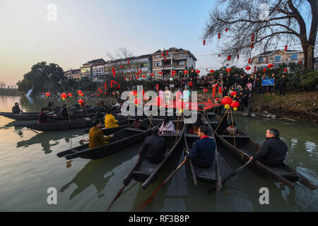 (190124) -- HANGZHOU, Jan. 24, 2019 (Xinhua) -- Villagers watch traditional opera in Hexidai Village of Tangqi Township in Hangzhou, capital of east China's Zhejiang Province, Jan. 23, 2019. Traditional Chinese classical operas like 'Liang Shanbo and Zhu Yingtai', also known as 'The Butterfly Lovers' are staged in Hexidai Village ahead of the Lunar New Year, or Spring Festival, which falls on Feb. 5 this year. (Xinhua/Xu Yu) Stock Photo