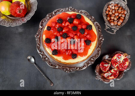 Fresh cheesecake with strawberries on a table. horizontal view from above Stock Photo