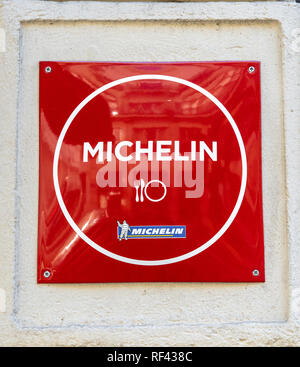 Michelin Guide Sign Michelin logo on the restaurant facade in Valencia city center. The ...